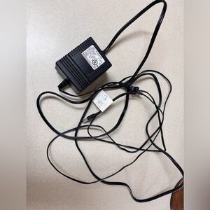 Skynet AC/DC Adapter Model: DND-3005-A Input: 120 VAC Output: 30 VDC 500mA